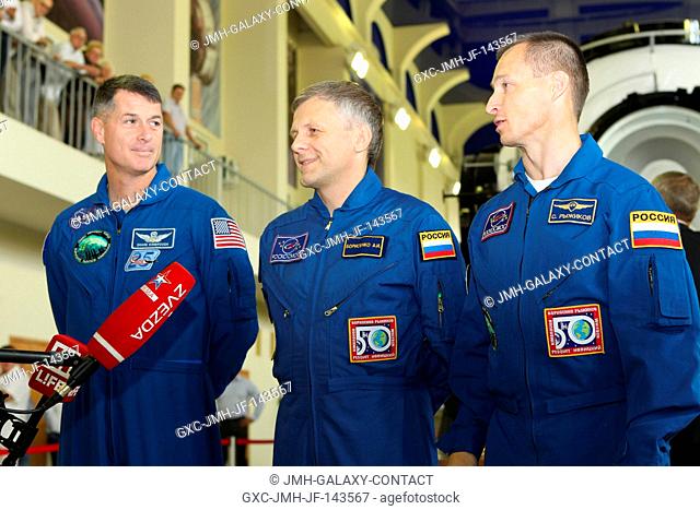 At the Gagarin Cosmonaut Training Center in Star City, Russia, Expedition 49-50 prime crew members Shane Kimbrough of NASA (left) and Andrey Borisenko (center)...