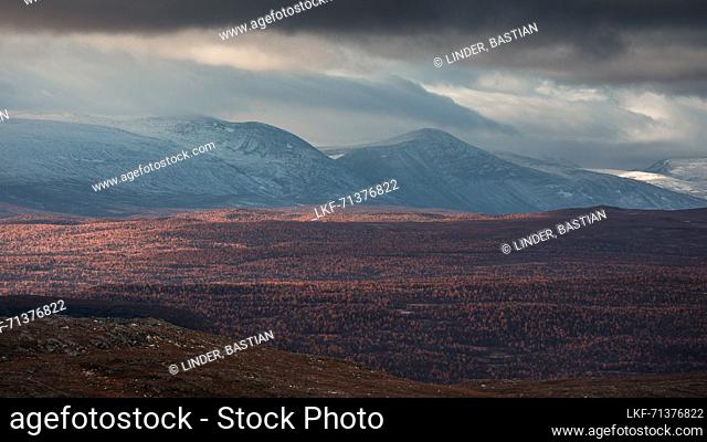 Mountain landscape with snowy peaks in Pieljekaise National Park in autumn in Lapland in Sweden