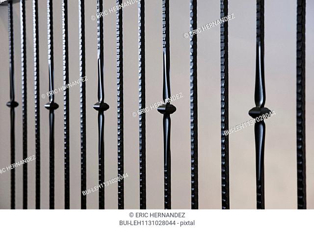 Close-up of wrought iron railing against wall; Moreno Valley; California; USA