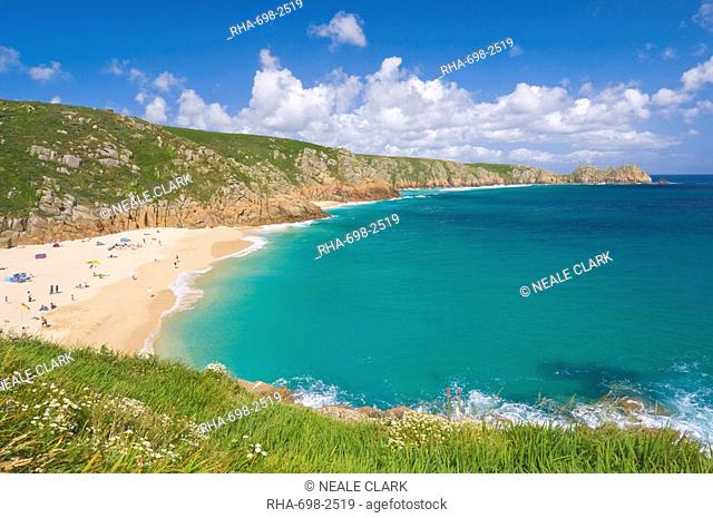 Holidaymakers and tourists sunbathing on Porthcurno beach, Cornwall, England, United Kingdom, Europe