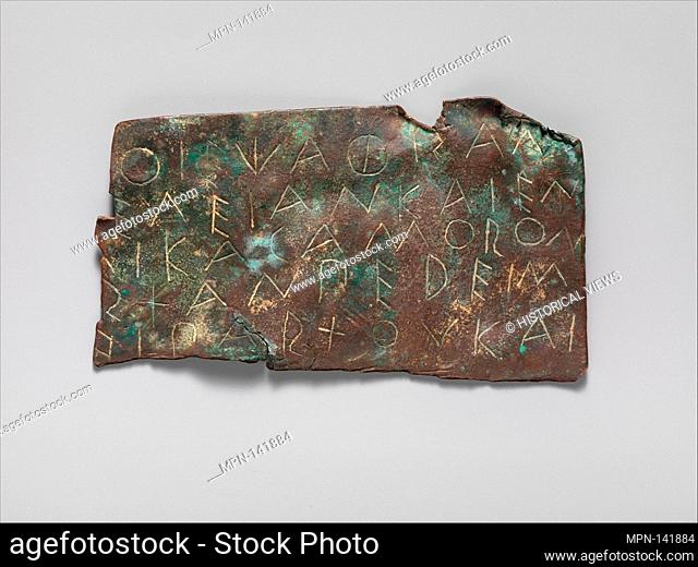 Bronze fragment of an inscription. Period: Archaic; Date: ca. 490-480 B.C; Culture: Greek, Sicilian; Medium: Bronze; Dimensions: Overall: 6 11/16 x 3 7/8 in