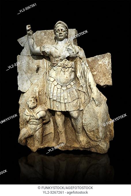 Roman Sebasteion relief sculpture of Roma armed, Aphrodisias Museum, Aphrodisias, Turkey. Against a black background.