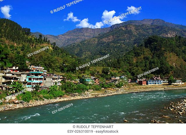 Mountain village on the banks of the river, Nepal