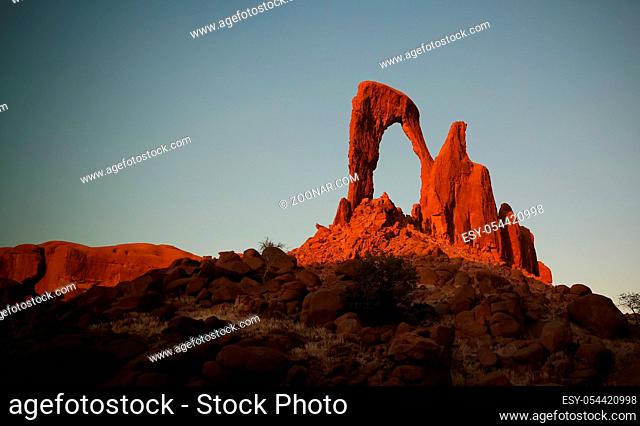 Abstract Rock formation at plateau Ennedi aka window arch at sunset, in Chad