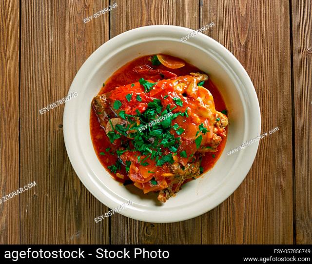 Chicken Marengo - French dish consisting of a chicken oil with garlic and tomato