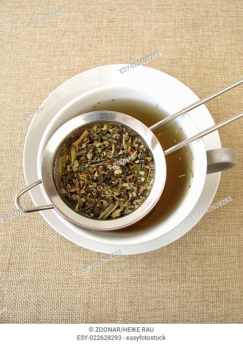 Herbal tea in tea strainer