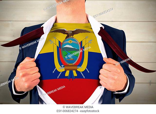 Composite image of businessman opening shirt to reveal ecuador flag