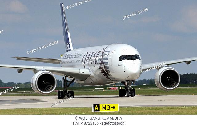An Airbus A350 stands on the runway after landing at the ILA Berlin Air Show at the future Willy Brandt Airport BER in Selchow near Schoenefeld, Germany