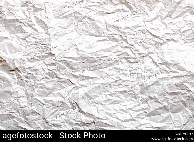 Detail of white crumpled paper texture