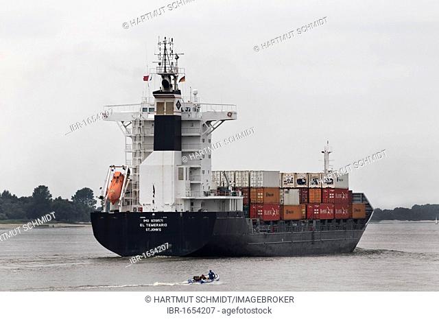 Container ship, El Temerario on the Elbe River, with a rubber dinghy in front, Hamburg, Germany, Europe