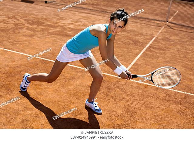 Playing tennis, summertime saturated theme