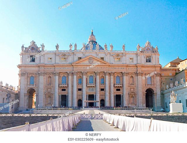 facade of St. Peter's cathedral in Rome at day, Italy