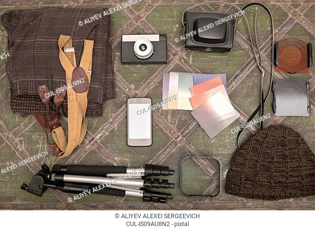 Photography equipment on table, overhead view