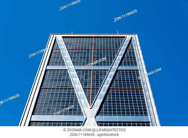 Madrid, Spain - March 20, 2017: Low angle view of The Gate of Europe towers against blue sky. They are twin office buildings designed by architect Philip...