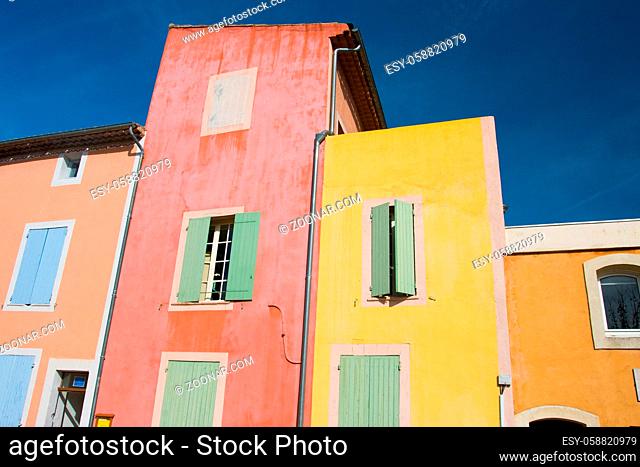 The beautiful colorful buildings of Roussillon on a winter's afternoon in Provence, France