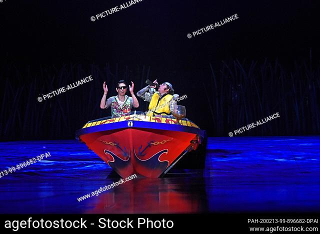 12 February 2020, Bavaria, Munich: The clowns Jon Monastero (l) and Misha Usov are in the same boat for the preview of Cirque du Soleil's ""Totem"" show
