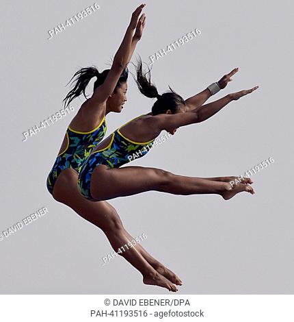 Dewi Setyaningsih and Linadini Yasmin of Indonesia in action during the women's 10m Synchro Platform diving preliminaries of the 15th FINA Swimming World...