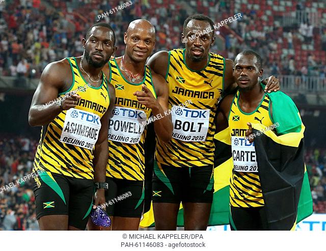 Jamaica's relay team with (L-R) Nickel Ashmeade, Asafa Powell, Usain Bolt and Nesta Carter celebrate after winning the the 4 x 100m Relay final at the 15th...