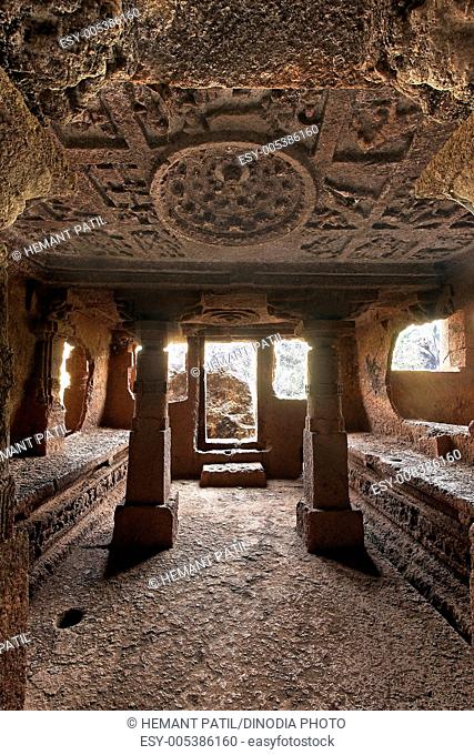 Inside view of sabha mandapa showing carved ceiling of cave number nineteen in Panhale Kazi caves ; Konkan ; Maharashtra ; India