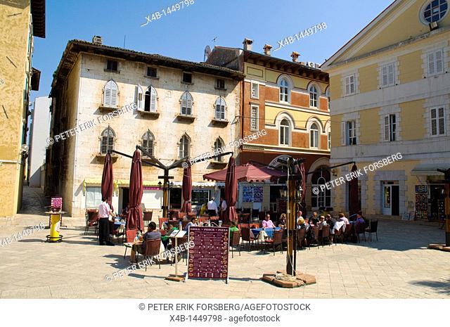 Restaurant and cafe terraces Trg Slobode square Stari Grad the old town Porec the Istrian peninsula Croatia Europe