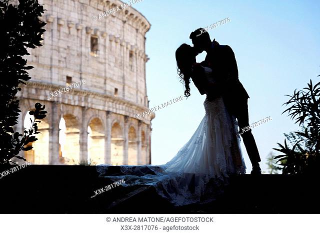 Wedding Couple silhouette. Roman Colosseum. Rome, Italy