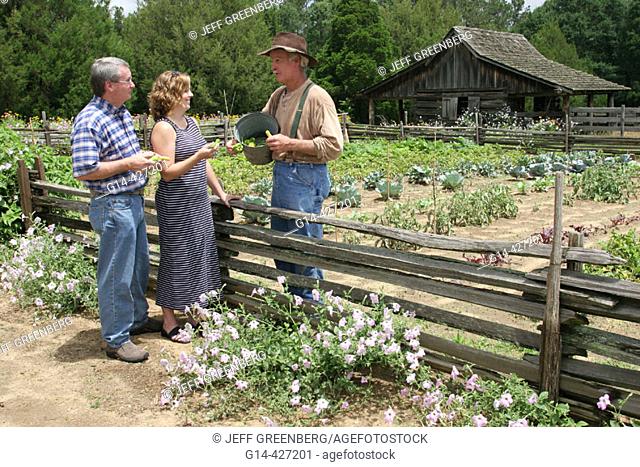 Landmark Park, Living History Farmstead c.1901, visitors, farmer, garden. Dothan, Wiregrass Region. Alabama. USA
