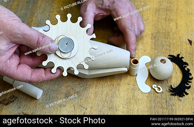 17 November 2020, Saxony, Seiffen: In the workshop of the toy maker Tino Günther in Seiffen the individual parts for the newest figure in the range