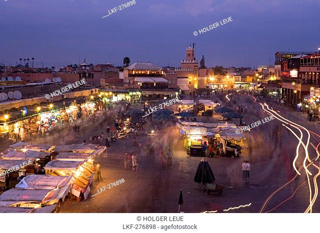 Djemaa el Fna Square at dusk, view from the terrace of Cafe Glacier, Marrakesh, Morocco, Africa