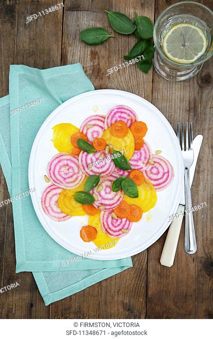 Turnip salad with golden beets, chioggia beets and carrots (seen from above)