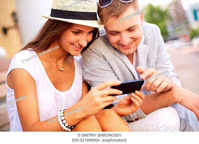 Couple with mobile phone