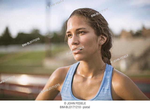 Mixed race athlete on sports field