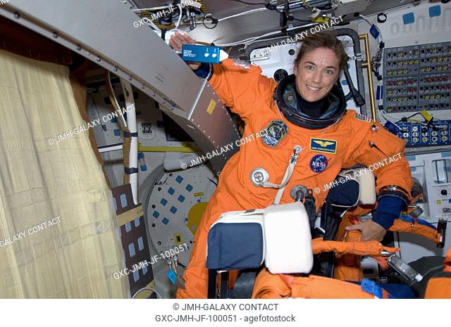 Astronaut Heidemarie Stefanyshyn-Piper, STS-126 mission specialist, attired in her shuttle launch and entry suit, is pictured on the middeck of Space Shuttle...