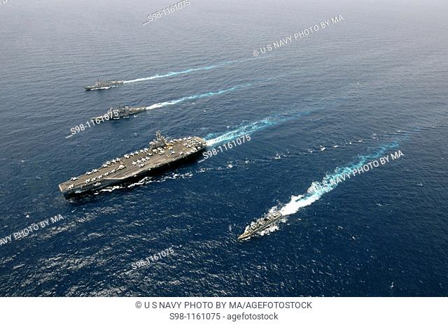 090927-N-1635S-309 ANDAMAN SEA Sept  27, 2009 The aircraft carrier USS Ronald Reagan CVN 76, center, the guided-missile destroyer USS Gridley DDG 101 and the...