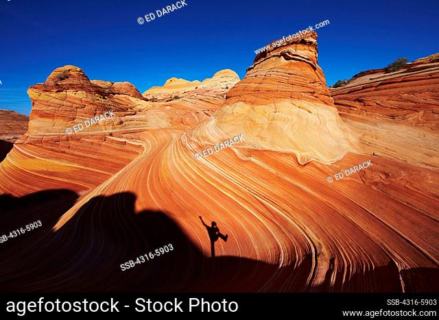 USA, Arizona, Shadow of hiker in Wave, Paria Canyon-Vermillion Cliffs Wilderness
