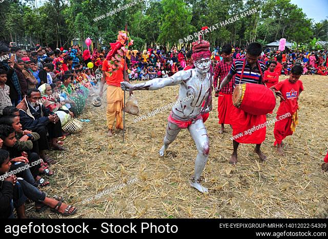 KULAWRA, BANGLADESH - JANUARY 14, 2022: A Devotee performs during Charak Puja Festival during Poush Shonkhanti of Bangla Calendar year
