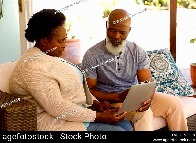 Senior african american couple spending time at home together