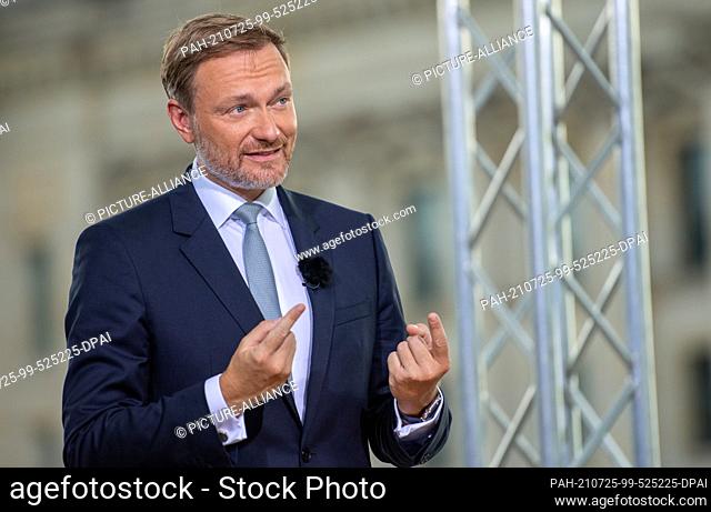 25 July 2021, Berlin: Christian Lindner, party leader of the FDP, speaks at the ARD summer interview on the terrace of the Marie-Elisabeth-Lüders-Haus