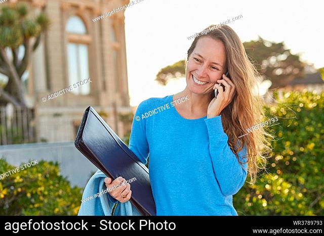 business woman, on the move, on the phone