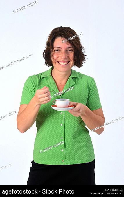 woman with a cup of coffe on white background