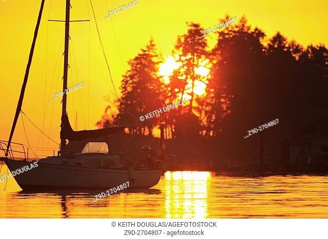 Sailboat at sunrise, Departure Bay, Nanaimo, Vancouver Island, British Columbia
