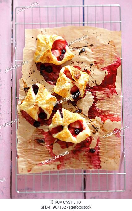 Strawberry and blueberry puff pastry turnovers