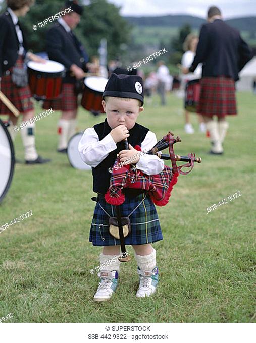 Small Boy with Bagpipes, Highland Games, Highlands, Scotland