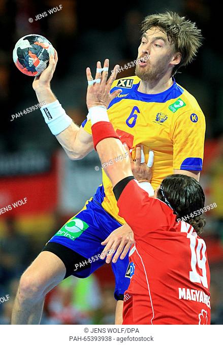Sweden's Jonas Källman (l.) in action against Hungary's Laszlo Nagy during the 2016 Men's European Championship handball group 2 match between Sweden and...