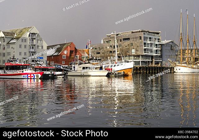 Harbour and waterfront. Tromso or Tromsoe during winter in the northern part of Norway. Europe, Scandinavia, Norway, March