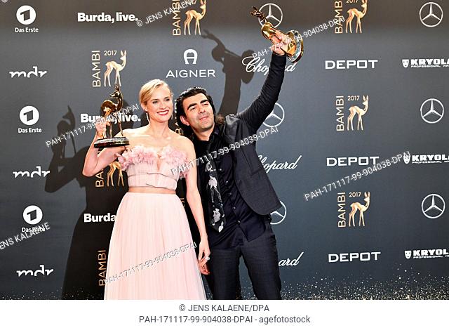 Actress Diane Kruger (L) and film director Fatih Akin showing their Bambi, which they won in the ""Special Jury Prize"" category, in Berlin, Germany