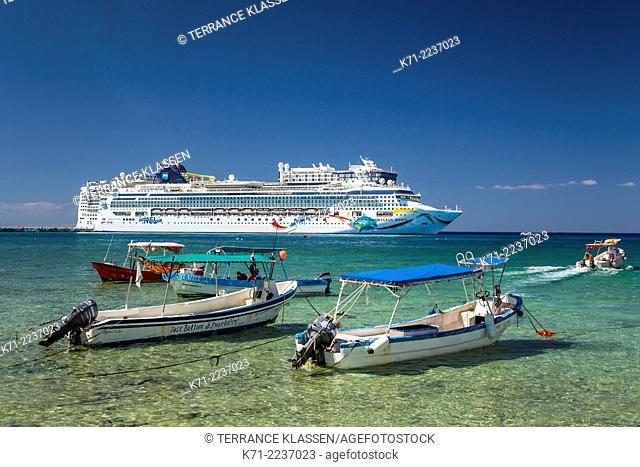 Fishing boats and cruise ships in the port of Cozumel, Mexico