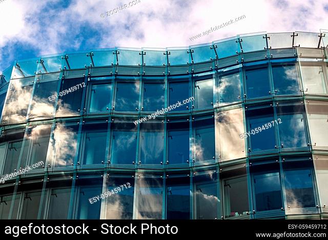 Detail of Modern Glass Building with Reflected Sky in Berlin, Germany