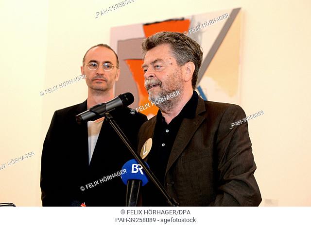 Ulrich Hamann, architect at Foster und Partner (L), and Helmut Friedel, Director of the new Lenbachhausm speak at the new Lenbachhaus in Munich, Germany