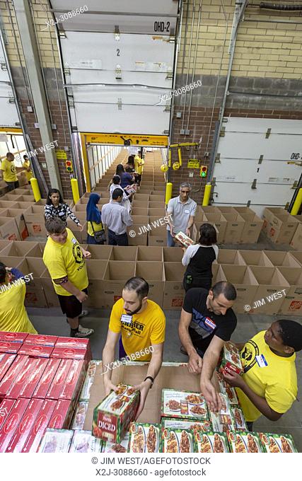 Novi, Michigan USA - Muslim volunteers package food boxes for the less fortunate in the Detroit area during the month of Ramadan