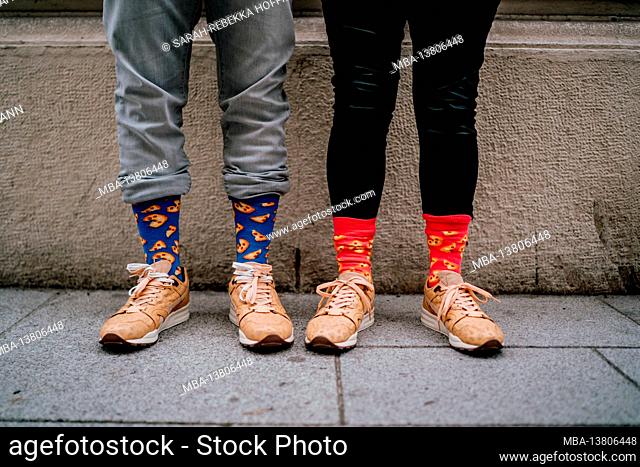 Couple with colorful socks, detail